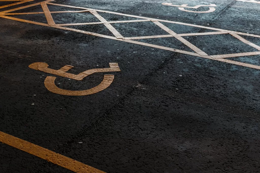 an international access symbol on asphalt road